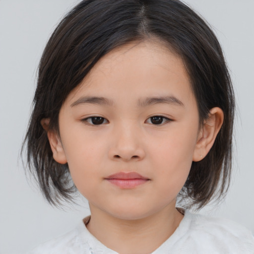 Neutral asian child female with medium  brown hair and brown eyes