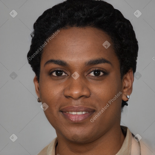 Joyful black young-adult female with short  black hair and brown eyes