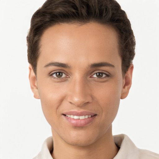 Joyful white young-adult female with short  brown hair and brown eyes