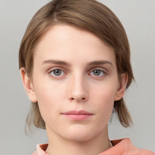 Neutral white young-adult female with medium  brown hair and grey eyes