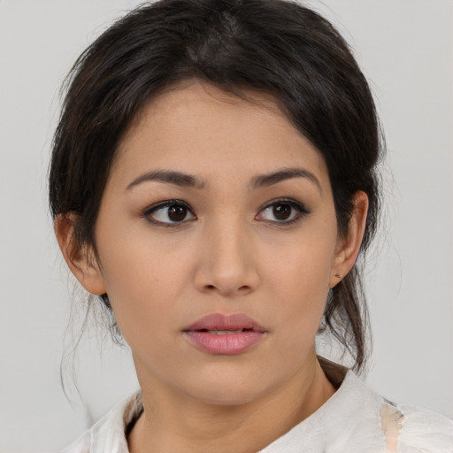 Neutral asian young-adult female with medium  brown hair and brown eyes