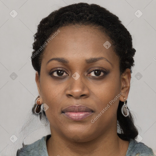 Joyful black young-adult female with medium  black hair and brown eyes