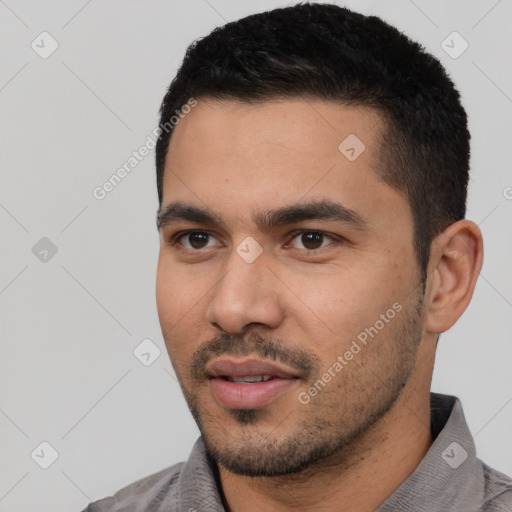 Neutral latino young-adult male with short  black hair and brown eyes