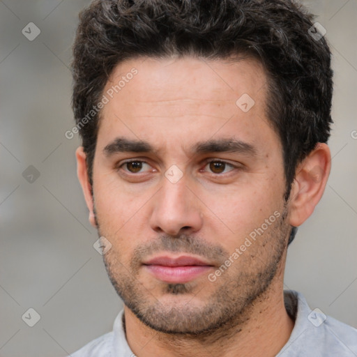 Neutral white young-adult male with short  black hair and brown eyes