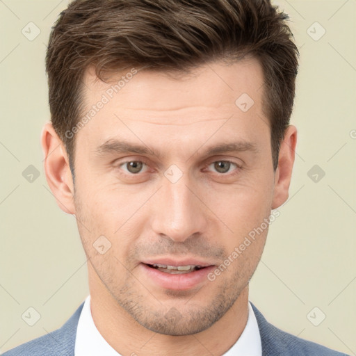 Joyful white young-adult male with short  brown hair and brown eyes