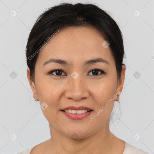 Joyful asian young-adult female with short  brown hair and brown eyes