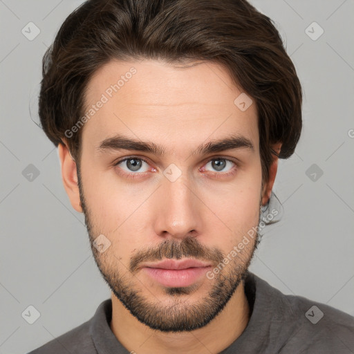 Neutral white young-adult male with short  brown hair and brown eyes