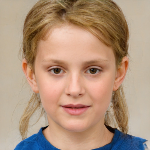 Joyful white child female with medium  brown hair and grey eyes