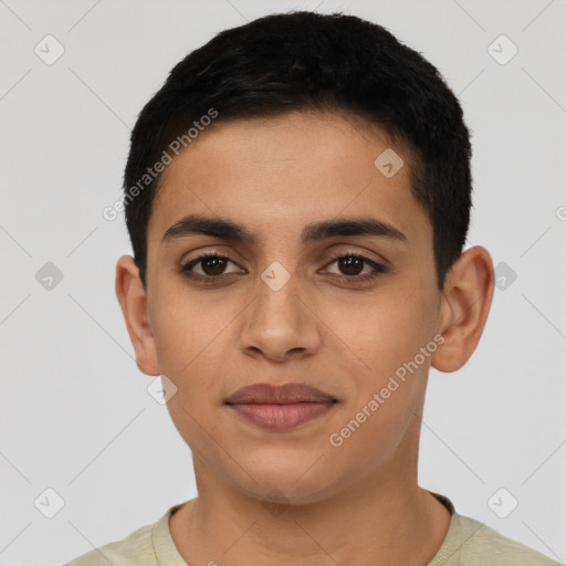 Joyful latino young-adult male with short  black hair and brown eyes