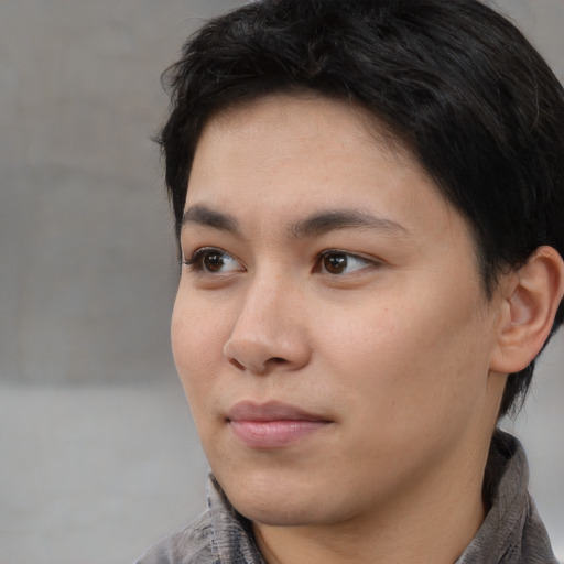 Neutral white young-adult female with short  black hair and brown eyes