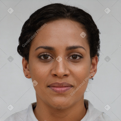 Joyful latino young-adult female with short  brown hair and brown eyes