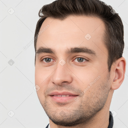 Joyful white young-adult male with short  brown hair and brown eyes