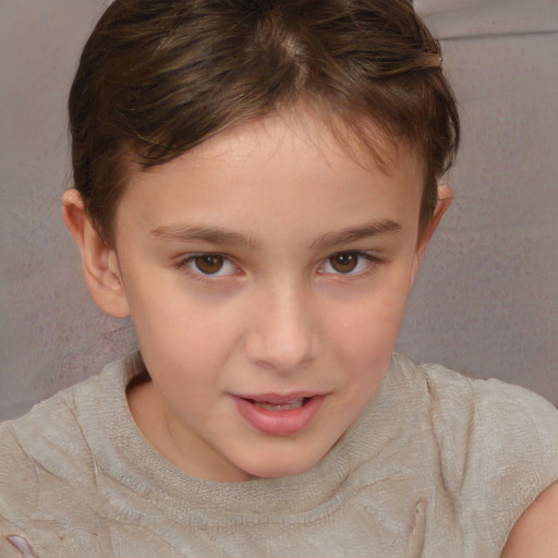 Joyful white child female with short  brown hair and brown eyes