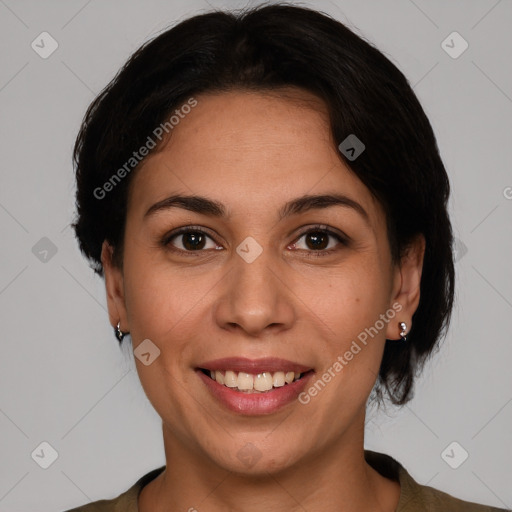 Joyful white adult female with short  brown hair and brown eyes