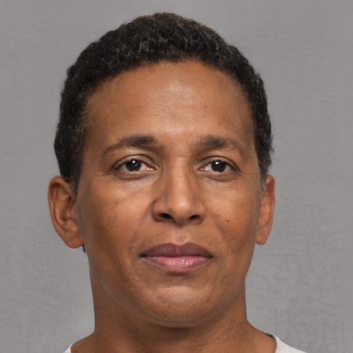 Neutral black adult male with short  brown hair and brown eyes