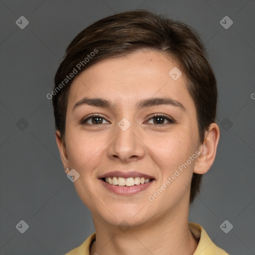 Joyful white young-adult female with short  brown hair and brown eyes