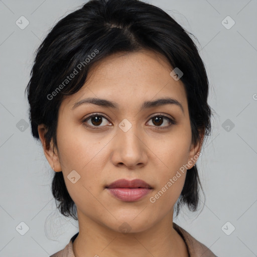 Joyful asian young-adult female with medium  black hair and brown eyes