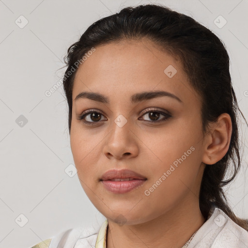 Joyful latino young-adult female with medium  brown hair and brown eyes