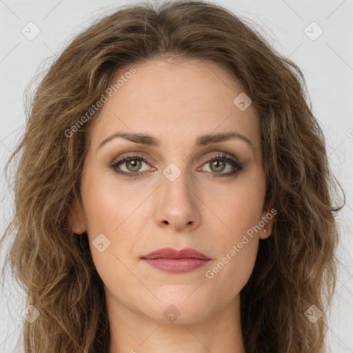 Joyful white young-adult female with long  brown hair and green eyes