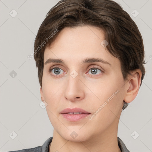 Neutral white young-adult female with short  brown hair and brown eyes