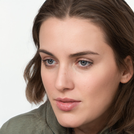 Neutral white young-adult female with long  brown hair and grey eyes