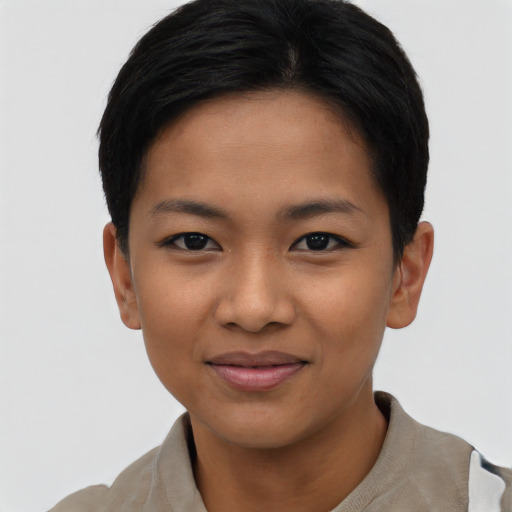 Joyful asian young-adult female with short  black hair and brown eyes