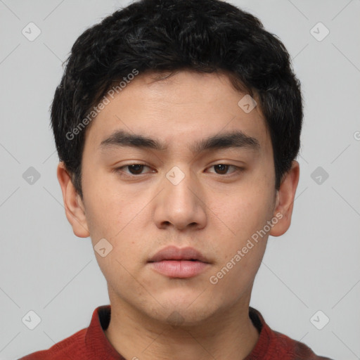Neutral white young-adult male with short  black hair and brown eyes