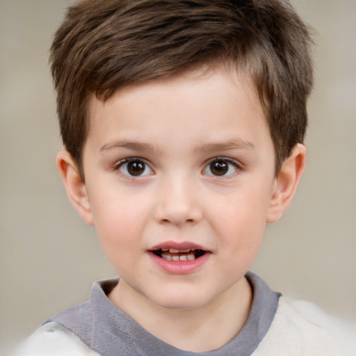 Joyful white child male with short  brown hair and brown eyes