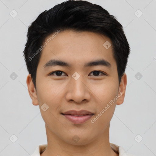 Joyful asian young-adult male with short  black hair and brown eyes