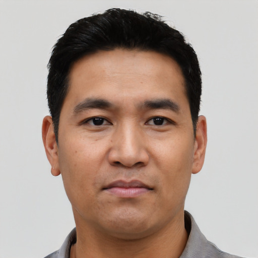 Neutral asian young-adult male with short  black hair and brown eyes