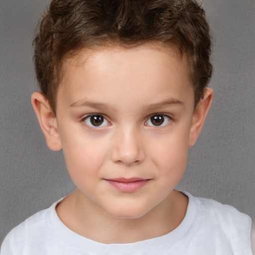 Joyful white child male with short  brown hair and brown eyes