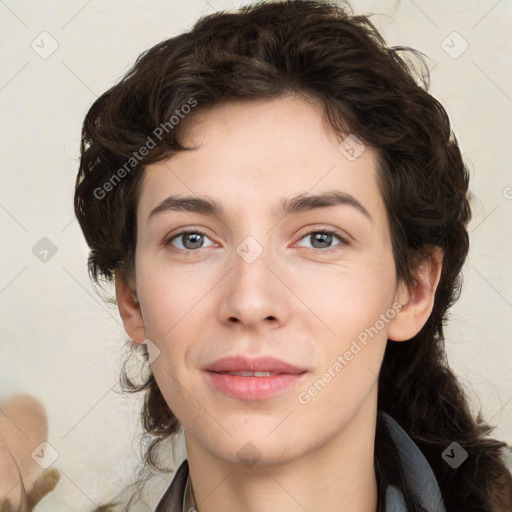 Joyful white young-adult female with medium  brown hair and green eyes