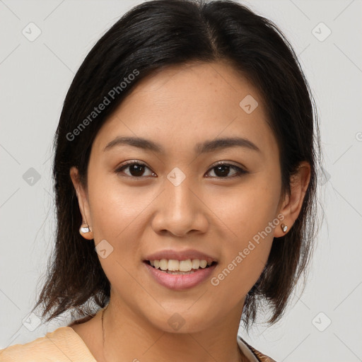 Joyful latino young-adult female with medium  brown hair and brown eyes