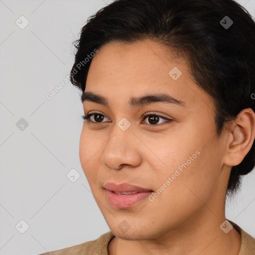 Joyful latino young-adult female with short  brown hair and brown eyes