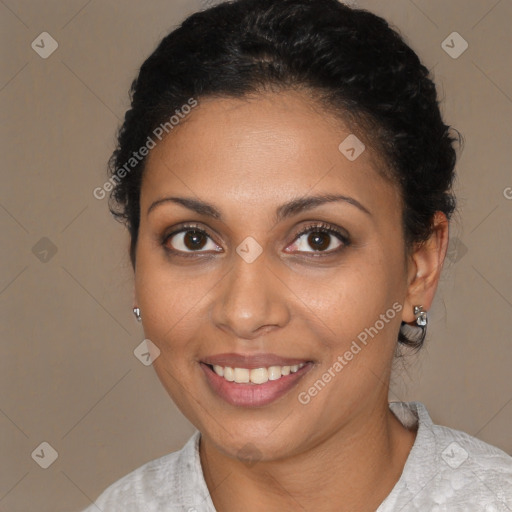 Joyful latino young-adult female with short  brown hair and brown eyes