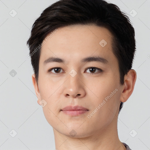 Neutral white young-adult male with short  black hair and brown eyes