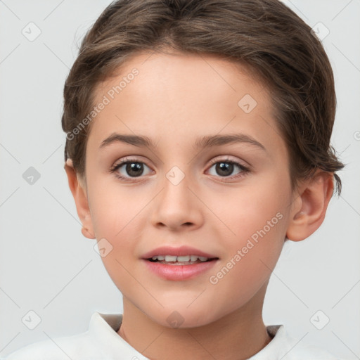 Joyful white child female with short  brown hair and brown eyes