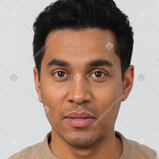 Neutral latino young-adult male with short  black hair and brown eyes