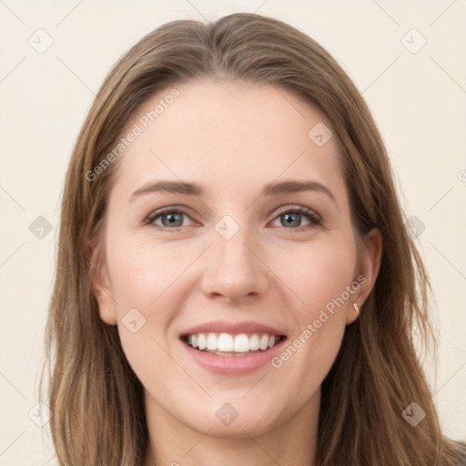 Joyful white young-adult female with long  brown hair and green eyes