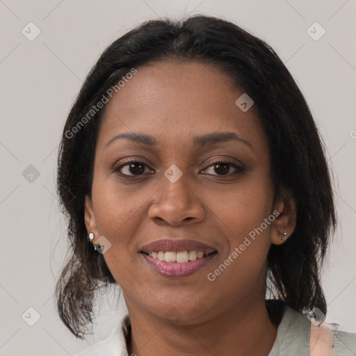 Joyful black young-adult female with medium  brown hair and brown eyes