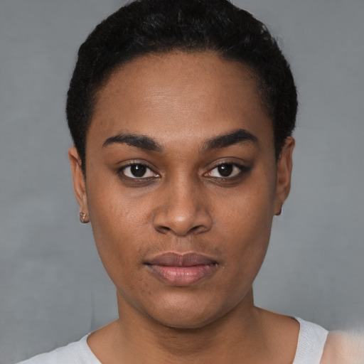 Neutral black young-adult female with short  black hair and brown eyes