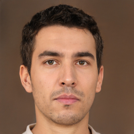 Neutral white young-adult male with short  brown hair and brown eyes