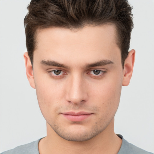 Neutral white young-adult male with short  brown hair and brown eyes