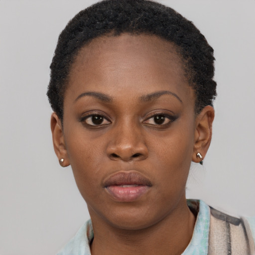 Neutral black young-adult female with short  brown hair and brown eyes