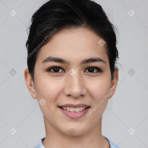 Joyful asian young-adult female with short  brown hair and brown eyes