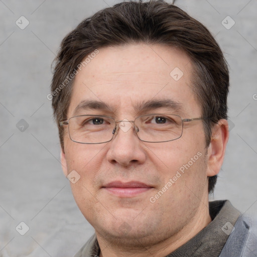 Joyful white adult male with short  brown hair and grey eyes