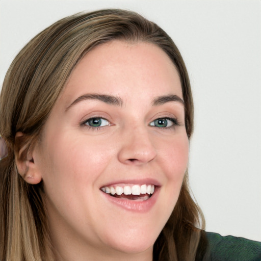 Joyful white young-adult female with long  brown hair and blue eyes