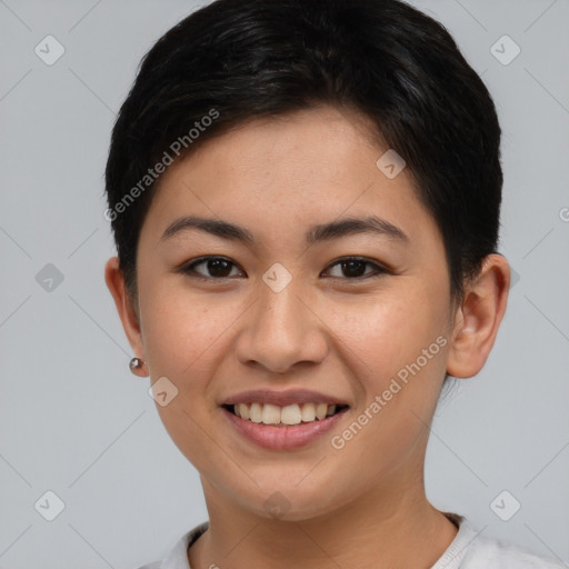 Joyful asian young-adult female with short  brown hair and brown eyes