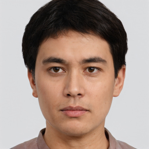 Neutral white young-adult male with short  black hair and brown eyes