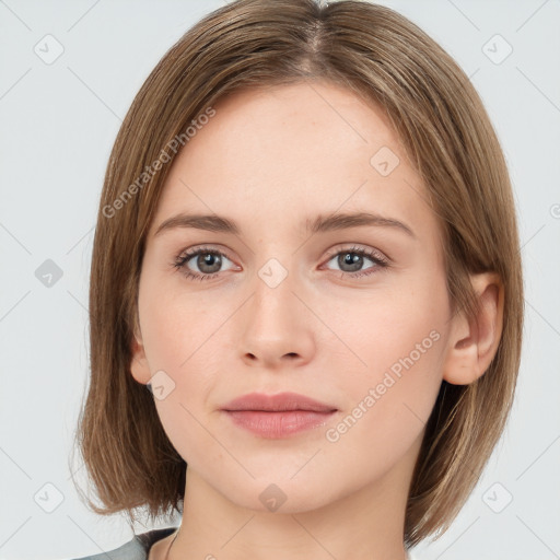 Neutral white young-adult female with medium  brown hair and grey eyes